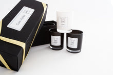 Load image into Gallery viewer, Cole&Rider Trio Gift Set. 3 votive candles in our beautiful black and white designer glass. Presented in a deluxe gift box tied with a lemon ribbon